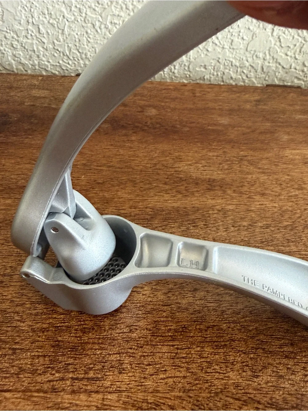 The PAMPERED CHEF Cast Aluminum Garlic Press